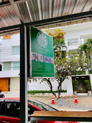 Outdoor sign at Greenlight Cafe & Bar in Koh Samui