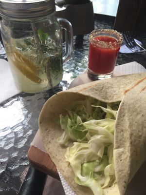 Falafel taco with vegetable juice at One Planet in Kyiv