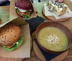 Mushroom Soup, Spinach Pie, Tofu Algae and Cheeseburger  at One Planet in Kyiv
