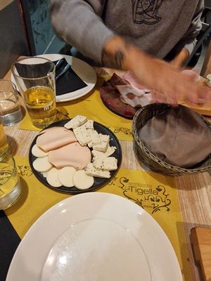 Cheese, meat and tofu all vegan. Fine but boring at La Tigella Verona in Verona