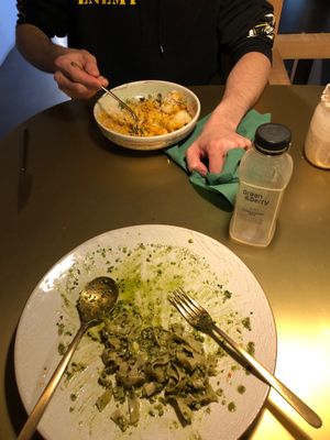 Coconut curry, spice milk, and kale pesto pasta. Sorry that food is half eaten, forgot to take a picture sooner.  at Green&Berry in Barcelona
