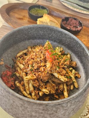 Authentic Greek pasta with vegan chicken, mushroom & black truffle at Yard of Taste in Zakynthos