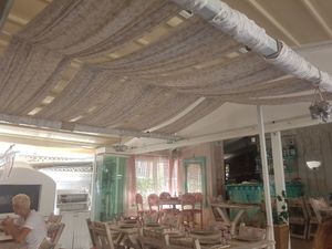 Only shows about 1/3 of the restaurant in this photo, but it was so pretty inside! at Yard of Taste in Zakynthos