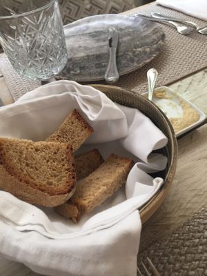 Sourdough bread and hummus (almost finished :D) at Yard of Taste in Zakynthos