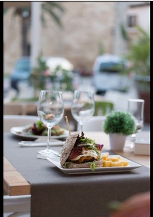 Overlooking at the ancient gate into the old town of alcudia at Me Gusta in Mallorca