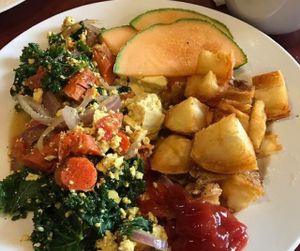Seasonal veg tofu scramble. Almond milk cappuccino. at Locavore Bistro in Boise