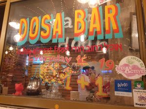 Restaurant's window at Dosa Bar in Tel Aviv
