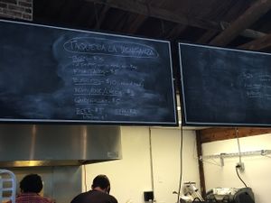 menu board at Taqueria La Venganza in Oakland
