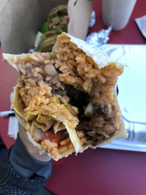 Burrito with mushroom specialty meat  at Taqueria La Venganza in Oakland