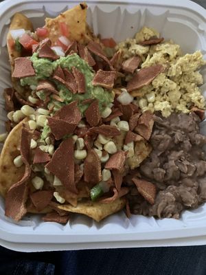 Chilaquiles + bacon  at Taqueria La Venganza in Oakland