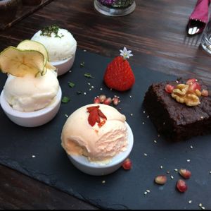 gluten free vegan peanut and walnut brownie with a selection of vegan ice teams  at Amala Conscious Food in Bournemouth
