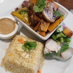 teriyaki satay tofu with Summer rolls  at Amala Conscious Food in Bournemouth