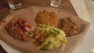 Vegan sampler with injera. at Teff in Stamford