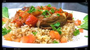 Baby eggplant over rice. at HANDHELDZ in Bethlehem