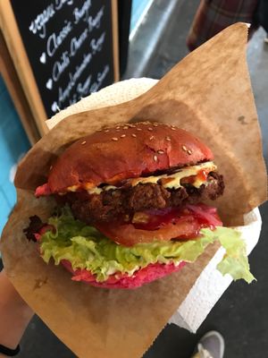Classic burger with pink bread  at Tofu Tussis in Berlin