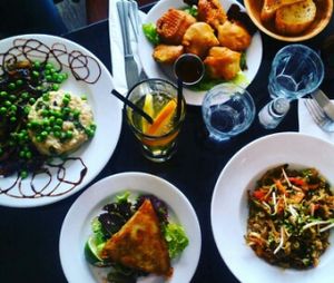 risotto,  stir fried veggies,  samosa, savoury donuts at Janine Loves Sunday in Paris