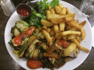 Tartine crostini (toasted bread spread with olive tapenade and grilled vegetables) at Janine Loves Sunday in Paris