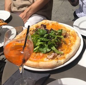 large pizza menu at Janine Loves Sunday in Paris