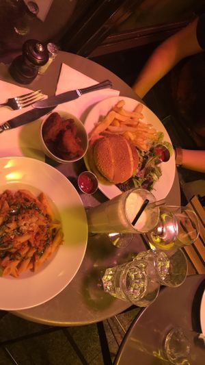 the vegan cheese burger, the penne Bolognese, chick'n nuggets and a pina colada!!!! all vegan and all amazing!!! the mock meats are incredible here at Janine Loves Sunday in Paris