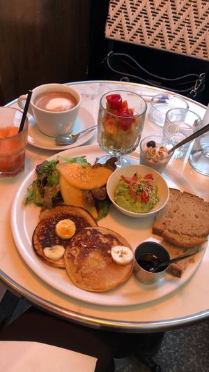 Avocado toast, yogurt, fruit, greens, waffles at Janine Loves Sunday in Paris