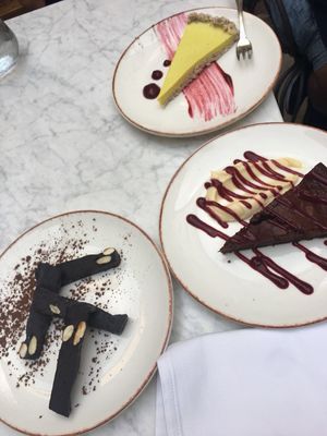 Vegan homemade almond truffle sticks, lemon tart and chocolate cake at Galerija Food in Split