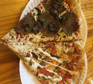 Vegan Pepperoni & Mushroom/ Vegan Taco with Tofu at Ian's Pizza in Madison