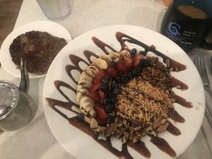 Chocolate quinoa breakfast bowl, vegan sausage, delicious coffee.  at Anna's House - Plainfield in Grand Rapids