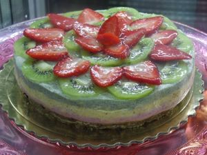 Raw cake with basic dates, figs , raisins , almonds , cashews layers of mousse and fruit in season . at Bio & Chocolate in Siena