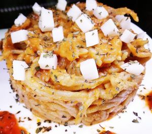Whole rice-amaranth-quinoa spaghetti with tomato and oregano and rice mozzarella. at Bio & Chocolate in Siena
