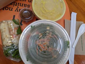 The Golden Temple Soup's broth and veg-tofu mixture are presented in separate bowls. at Chau VeggiExpress - Granville Island Stall in Vancouver