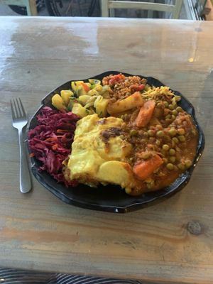 4 salads and an entree for under 10 euro  at Kiez Vegan - Warschauer Str in Berlin