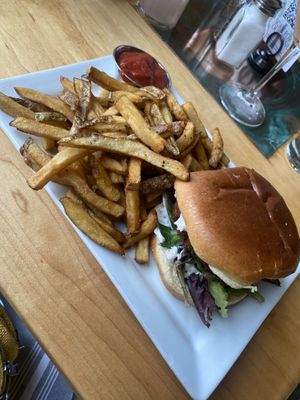 Crab cake sandwich with fries  at Leaf Vegetarian Restaurant in Boulder