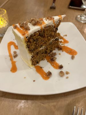Bad excuse for a salad that was overpriced and made my non vegan brother in law want to leave. This carrot cake tasted a day old. My past experiences have been better.   at Leaf Vegetarian Restaurant in Boulder