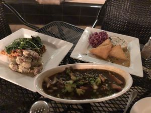 Feasting! BBQ tempeh with dill potato salad, curry tofu, udon rice w/ veggies at Leaf Vegetarian Restaurant in Boulder