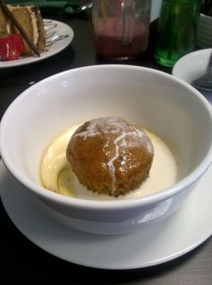 Vegan sticky toffee pudding with cream at The Green Room in Middlesbrough