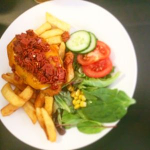 Vegan parmo with spicy  at The Green Room in Middlesbrough