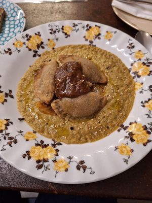 Ravioli baked with legumes with hint of curry.  Outside sa at Le Golose Imperfezioni in Como