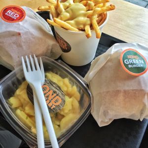 Burgers, potatoes with garlic mayo and potatoe salad at XOND in Stuttgart