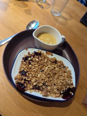 Berry crumble and custard at Earthlings in Bolton