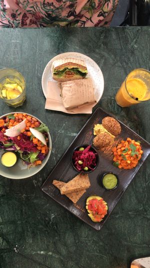 Falafel plate, falafel sandwich and kimchi bowl at Hafnia Bar in Copenhagen