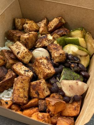 Large bow with Cuban beans and perfectly cooked/ seasoned tofu  at Revel Kitchen in Brentwood