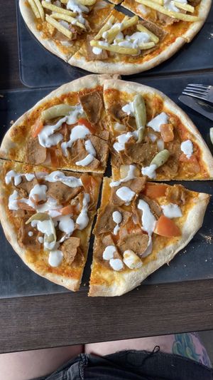 Vegan kebab pizza with vegan garlic sauce and a side of fries 🍟   at Kroppkärrs Pizzeria in Karlstad