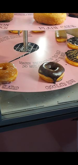 All vegan doughnuts on the bottom shelf  at Voodoo Doughnut - E Colfax in Denver