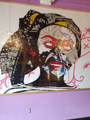 Mural at Voodoo Doughnut - E Colfax in Denver