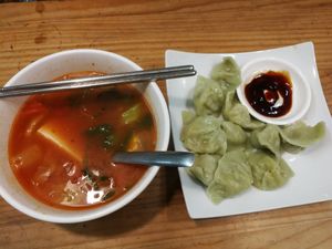 Tomato soup with vegetables and dumplings (my recommendation) at Brother Su Vegan Kitchen in New Taipei City