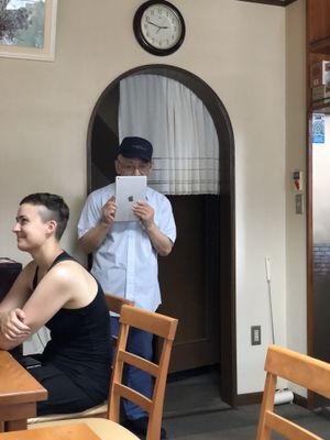 The very passionate boss who’s try his best to use Google translate  at Arashiyama-kan in Kyoto