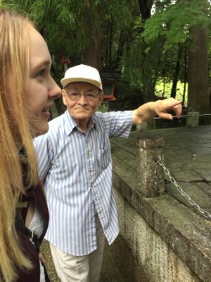 Owner showed us the shrine around the corner while our food was prepared! at Arashiyama-kan in Kyoto