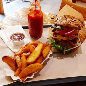 Burger, potatoes & smoothie at Farma Burgerownia Roslinna in Krakow