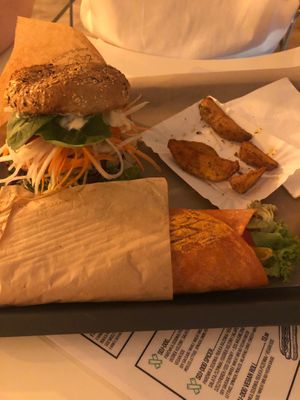 gyros wrap, wedges, farma burger at Farma Burgerownia Roslinna in Krakow