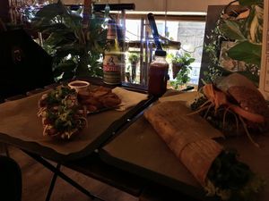 Classic zapienkanka, wedges, vegan gyros wrap and rolnik burger  at Farma Burgerownia Roslinna in Krakow